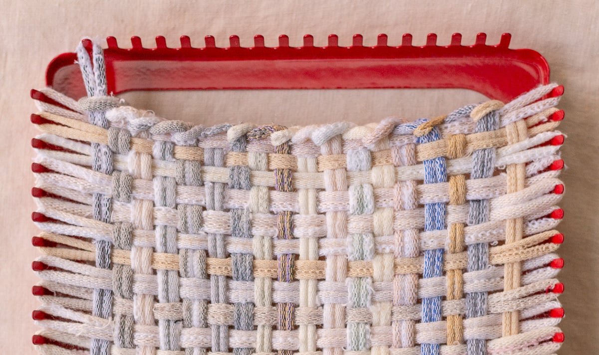 removing weaving from potholder loom